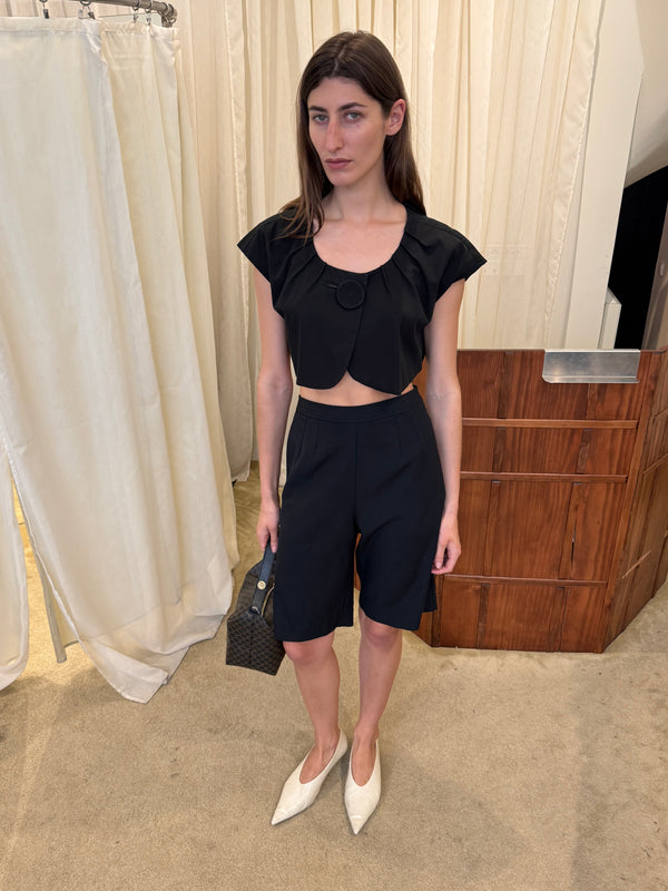 Black bermuda shorts