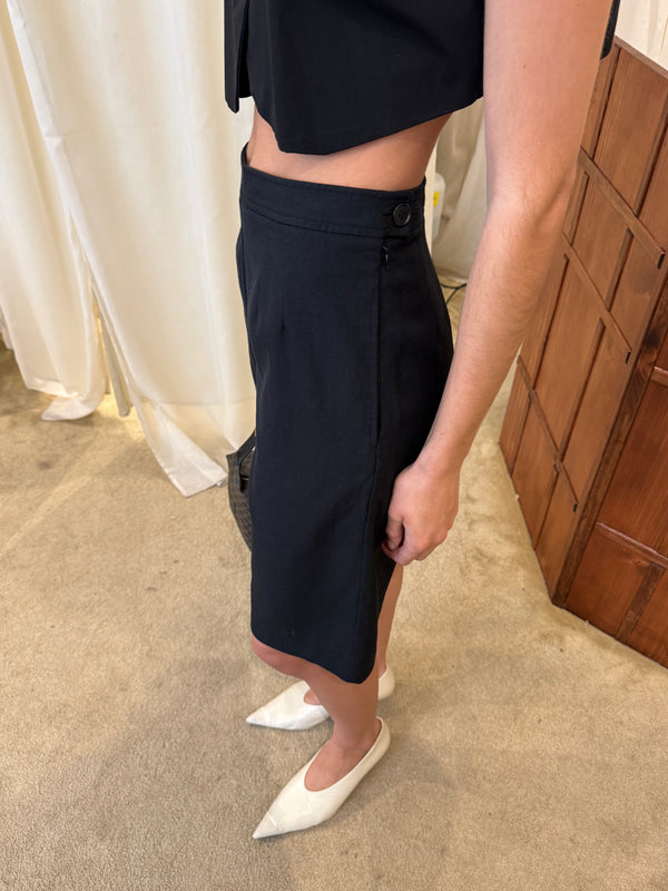 Black bermuda shorts