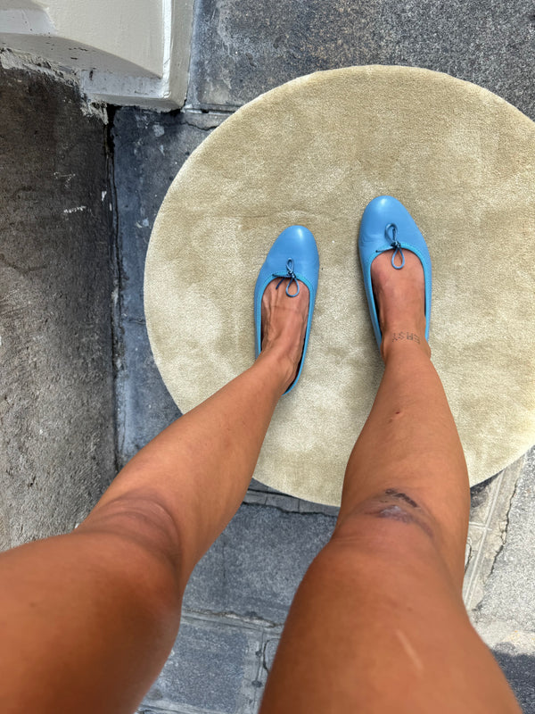 Blue ballet flats